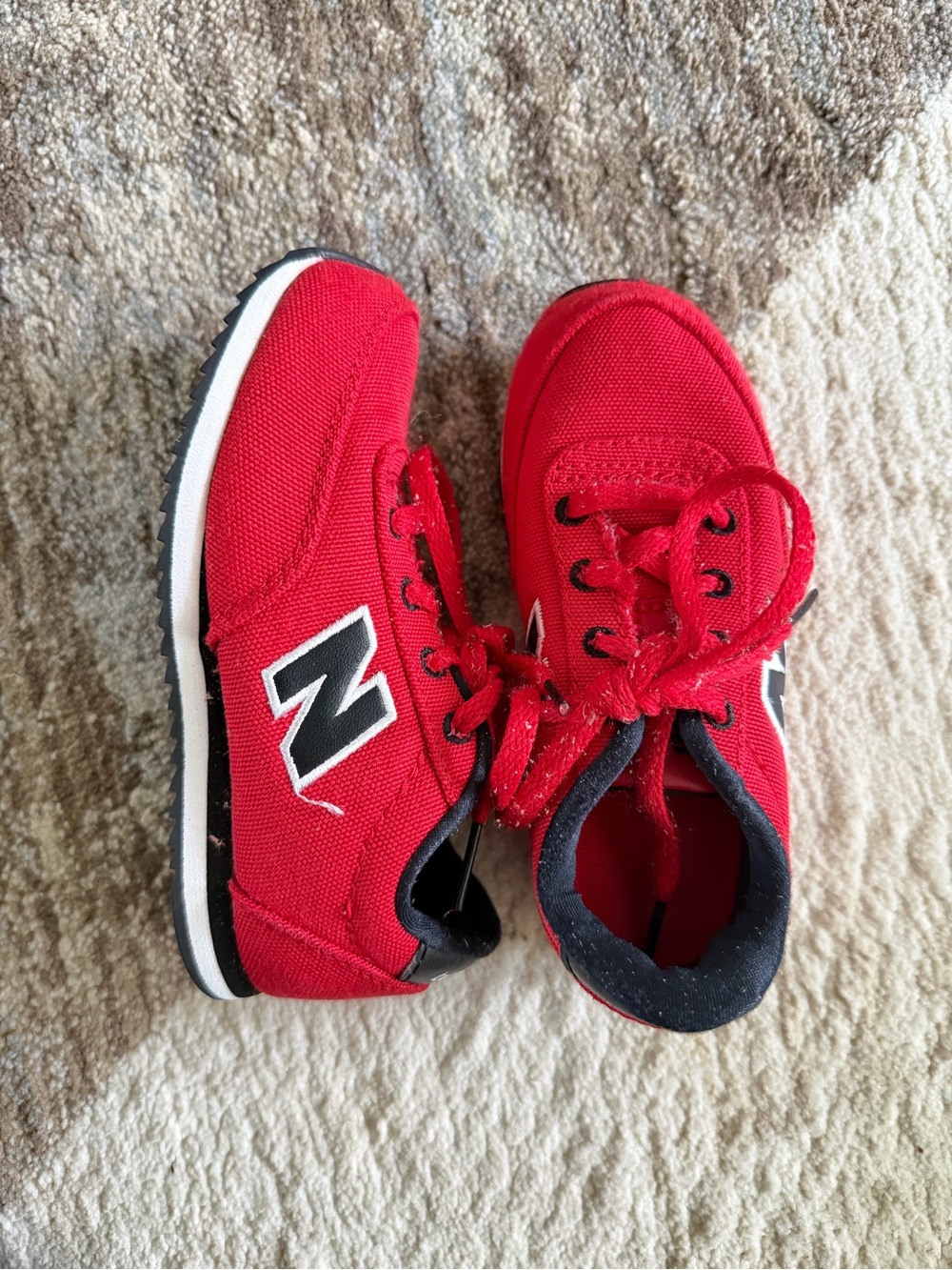 New Balance Kids Red Athletic Sneakers with Black Accents